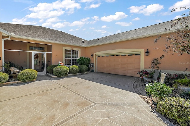 ranch-style house featuring a garage