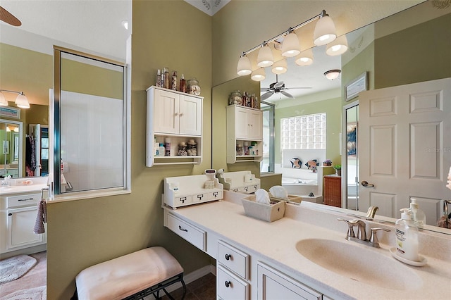 bathroom featuring vanity and ceiling fan