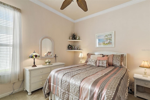 bedroom featuring light carpet, ornamental molding, and ceiling fan