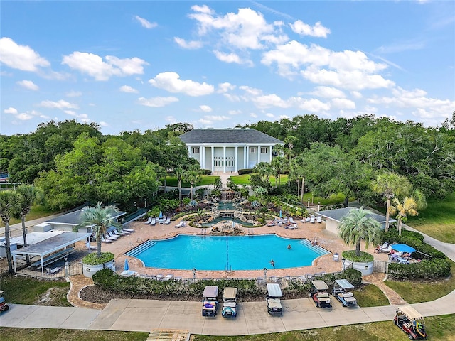 view of swimming pool with a patio area