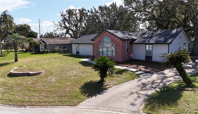 single story home with a front yard