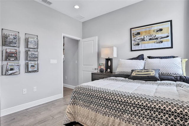 bedroom featuring wood-type flooring