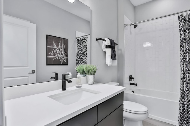 full bathroom featuring vanity, shower / bath combo, toilet, and tile patterned floors