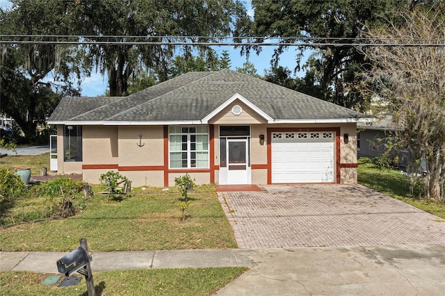 ranch-style house with a front lawn and a garage