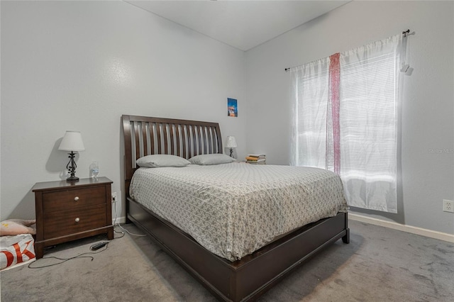 bedroom featuring carpet