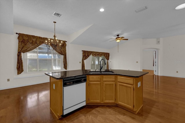 kitchen with white dishwasher, sink, wood-type flooring, and a center island with sink