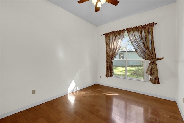 unfurnished room featuring hardwood / wood-style floors and ceiling fan