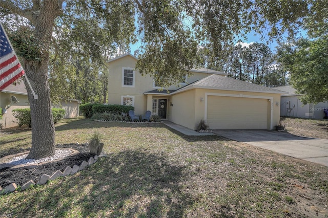 view of front of home featuring a garage and a front yard