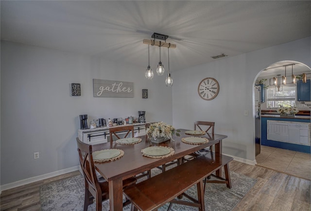 dining space featuring light hardwood / wood-style flooring