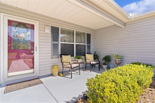 property entrance with a porch