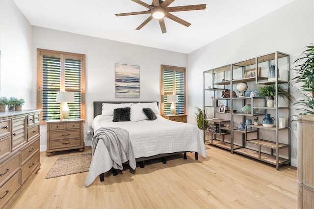 bedroom featuring light hardwood / wood-style floors and ceiling fan