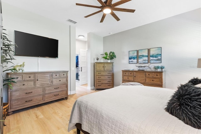 bedroom featuring light hardwood / wood-style floors and ceiling fan