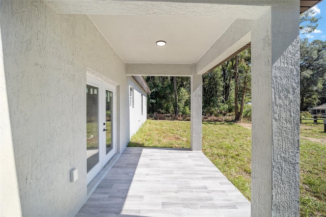 view of patio featuring french doors