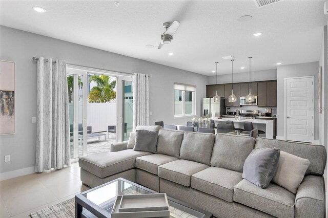 living room with ceiling fan