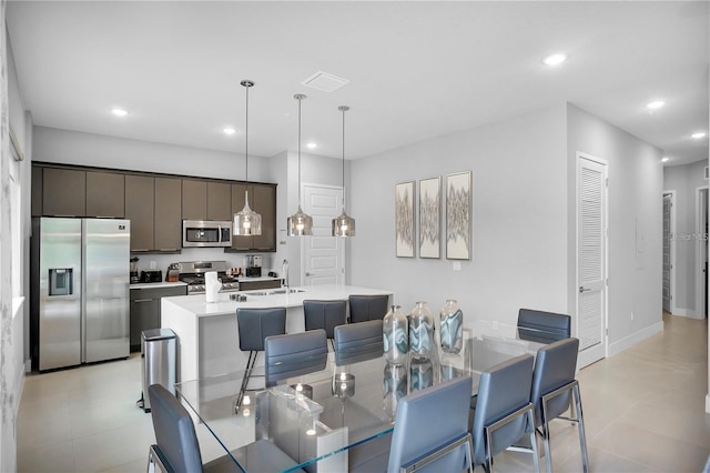 dining room featuring sink