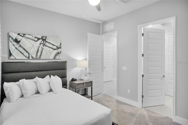 bedroom featuring ceiling fan and light colored carpet