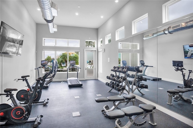 gym featuring a high ceiling