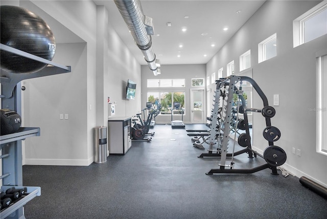 gym with a high ceiling