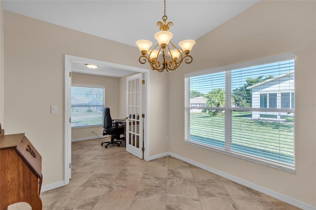 office area with lofted ceiling, a chandelier, and a wealth of natural light