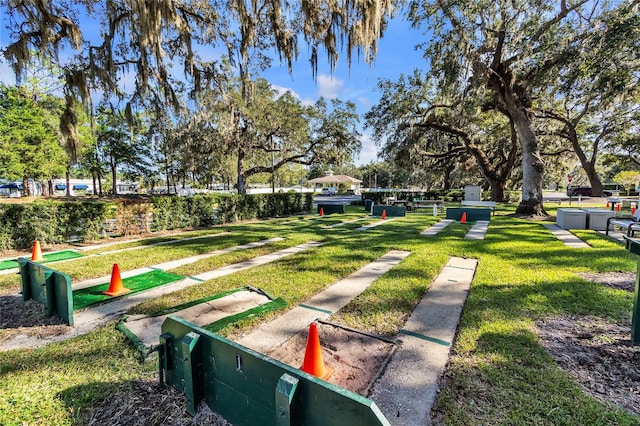 surrounding community featuring a lawn