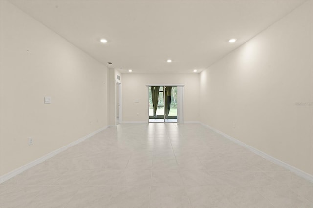 empty room featuring light tile patterned flooring