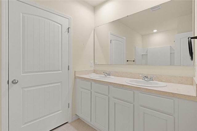 bathroom featuring vanity and tile patterned floors