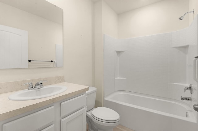 full bathroom featuring vanity, washtub / shower combination, and toilet