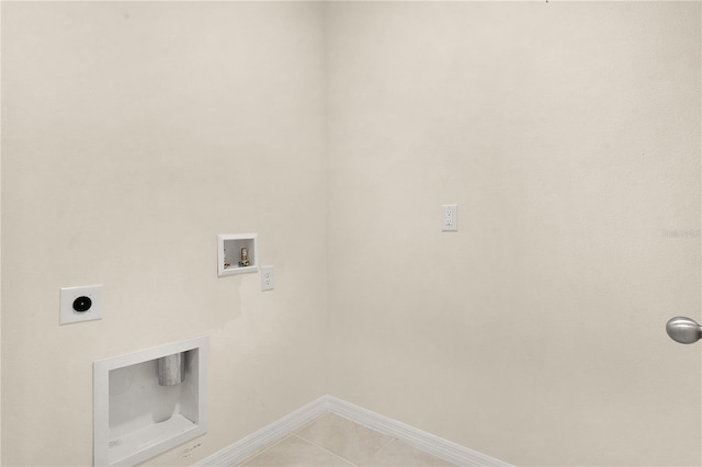 laundry area featuring washer hookup, hookup for an electric dryer, and light tile patterned floors