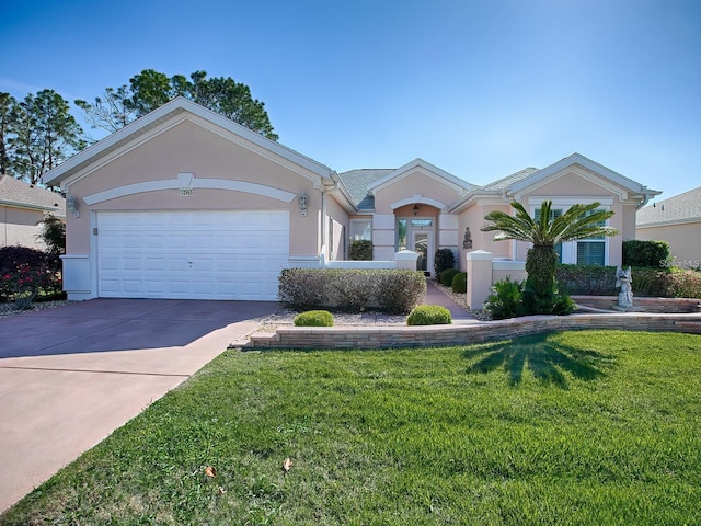 single story home with a garage and a front lawn