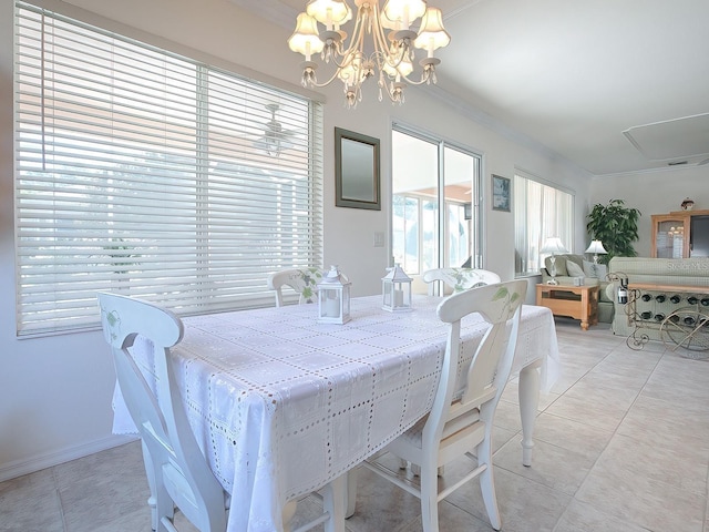 tiled dining area with a notable chandelier and ornamental molding