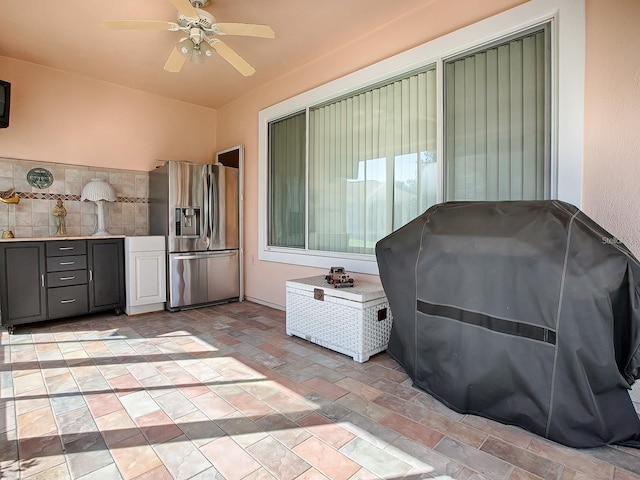 view of patio with grilling area and ceiling fan