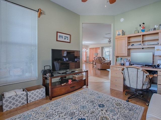 office space featuring light hardwood / wood-style floors and ceiling fan