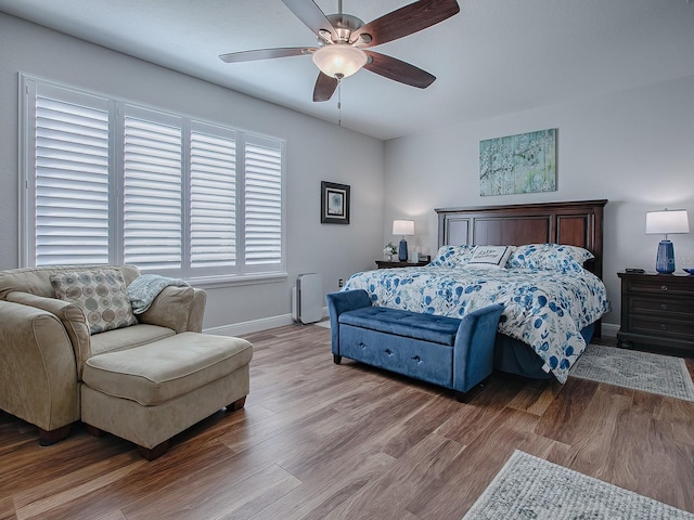 bedroom featuring ceiling fan and light wood-type flooring