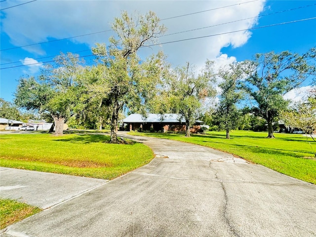 exterior space featuring a front lawn