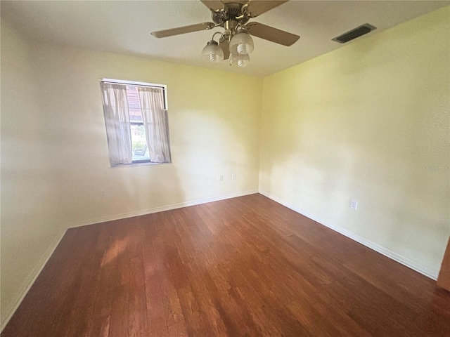 unfurnished room with hardwood / wood-style floors and ceiling fan