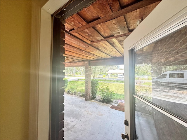 doorway with concrete floors