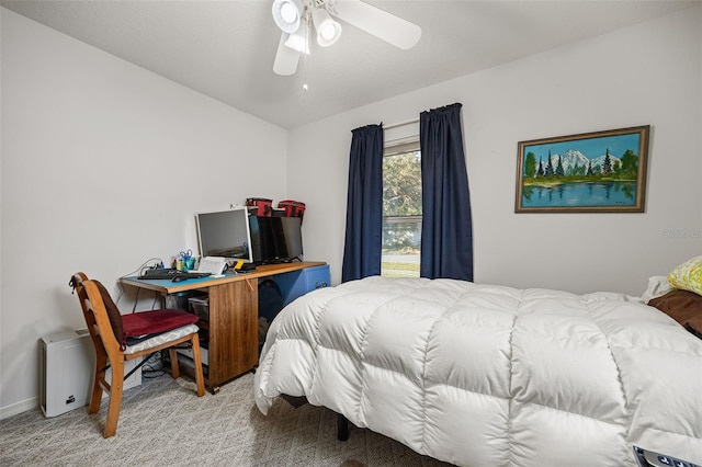 bedroom featuring ceiling fan and carpet floors