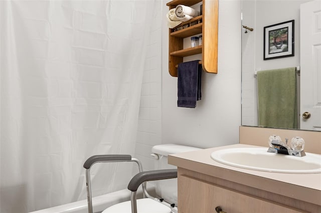 full bathroom featuring vanity, toilet, and shower / bath combo with shower curtain