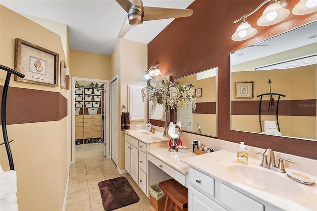 bathroom with vanity, ceiling fan, and tile patterned flooring