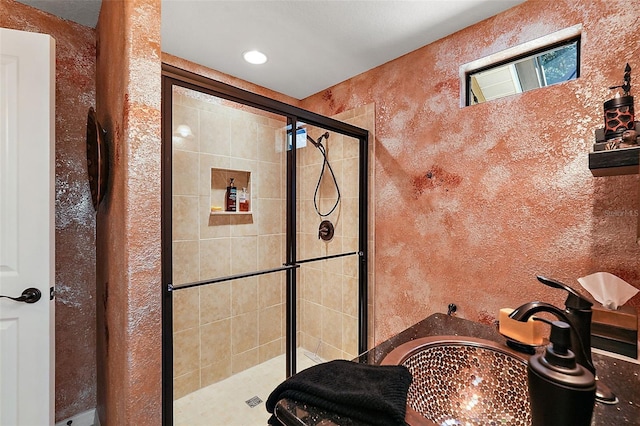 bathroom with an enclosed shower