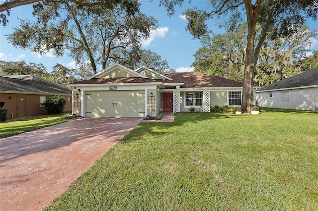 single story home featuring a garage and a front yard