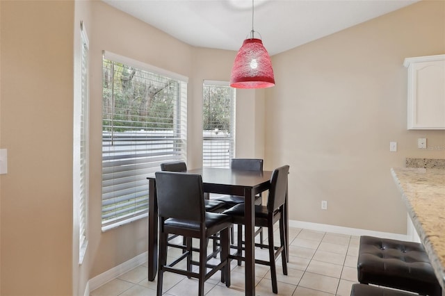 dining room featuring light tile patterned floors