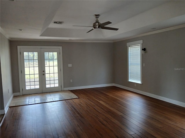 unfurnished room featuring french doors, ornamental molding, wood-type flooring, and ceiling fan