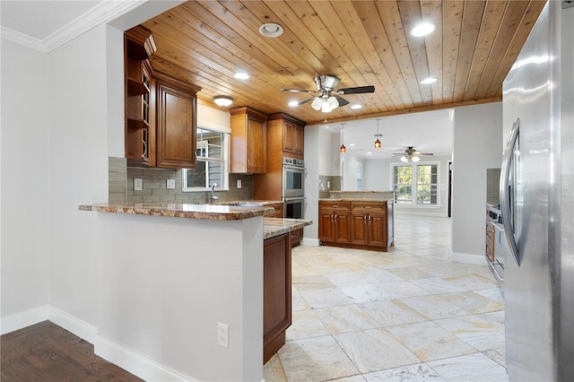 kitchen with wood ceiling, kitchen peninsula, stainless steel appliances, backsplash, and light stone counters