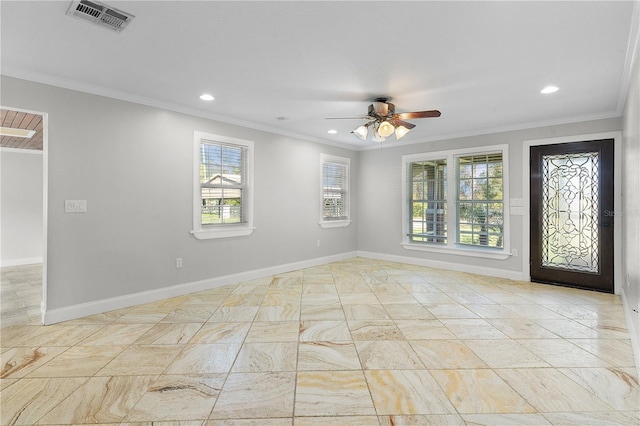 empty room with ornamental molding and ceiling fan