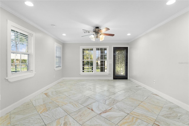 unfurnished room with crown molding and ceiling fan