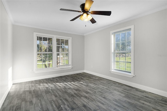 empty room featuring ceiling fan, crown molding, and dark hardwood / wood-style flooring