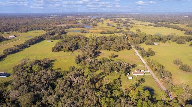 birds eye view of property with a rural view