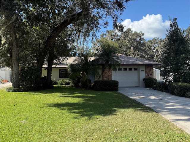 ranch-style home with a front lawn and a garage