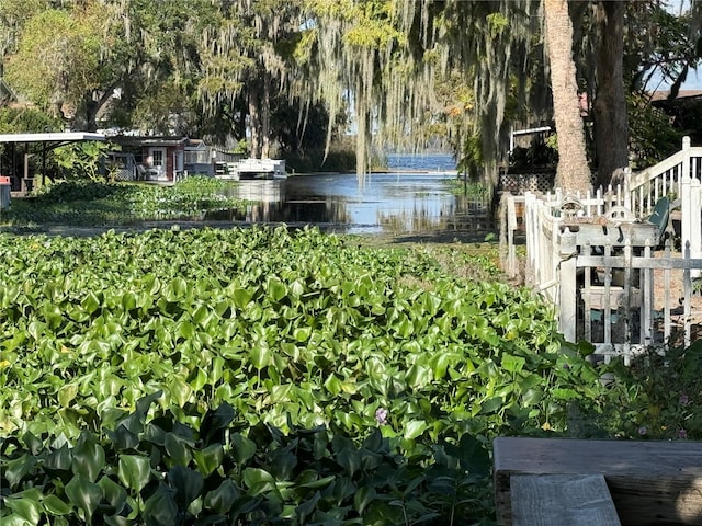 view of home's community featuring a water view